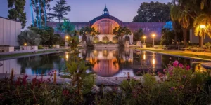 Luxury chauffeur drop-off at Balboa Park museum entrance in San Diego 